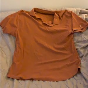 100%cotton rust colored Born polo shirt